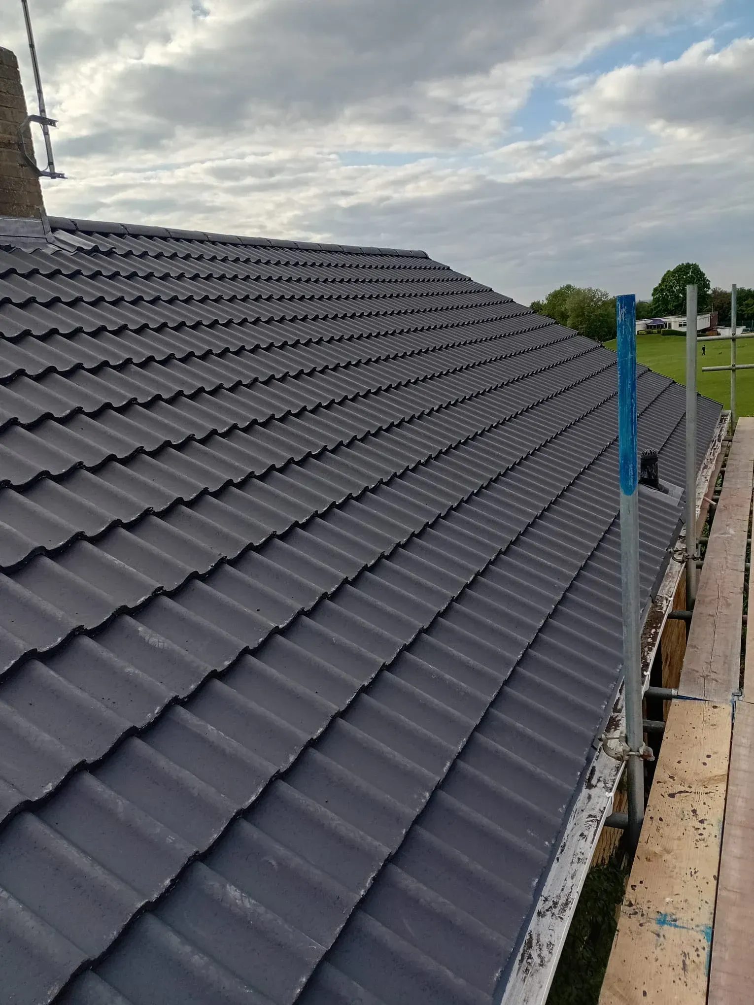 Completed tile roof replacement by JS Roofers in Cheltenham