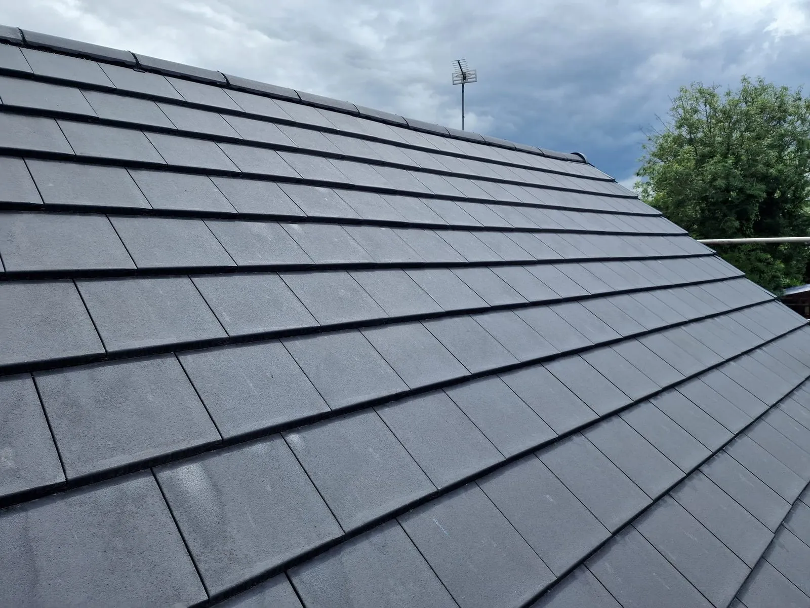 Completed slate tile re-roof on a residential property