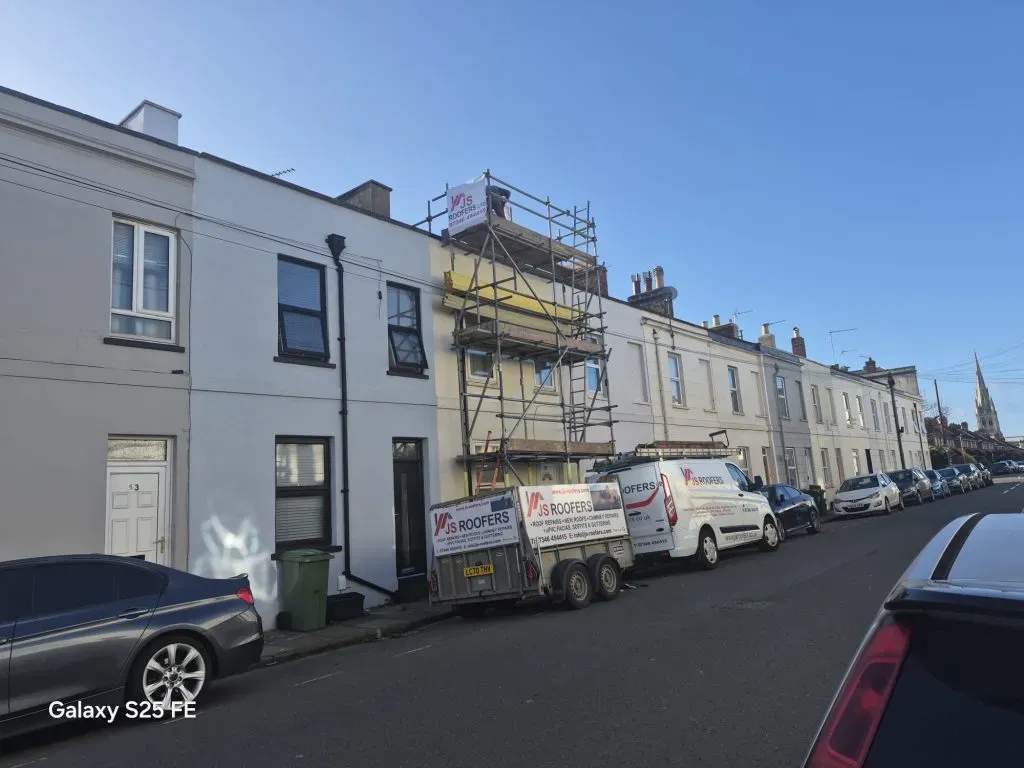 JS Roofers van on site at a Cheltenham terrace job
